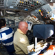 Astronaut John Phillips (right) on the Space Shuttle Discovery flight deck (Image: Getty Images)